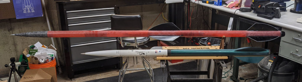 A photo of a single-stage Shapeshifter Jr. rocket alongside the two-stage version.
